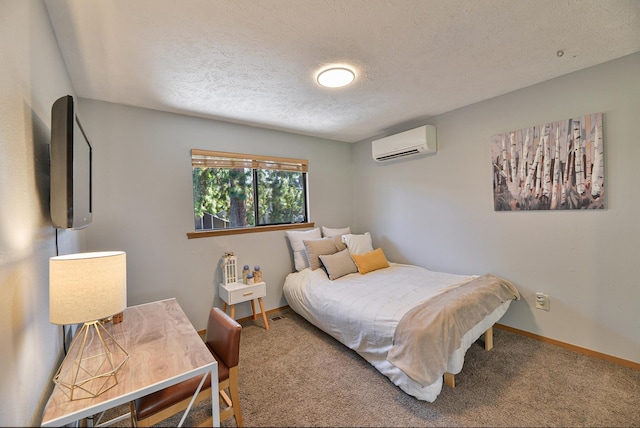 4232 E 10th Ave, Spokane, WA 99202 - bedroom featuring a wall mounted air conditioner, carpet, and a textured ceiling