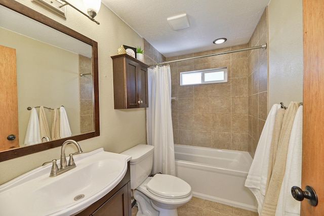 4232 E 10th Ave, Spokane, WA 99202 - bathroom with shower / bath combo, vanity, and tile patterned flooring