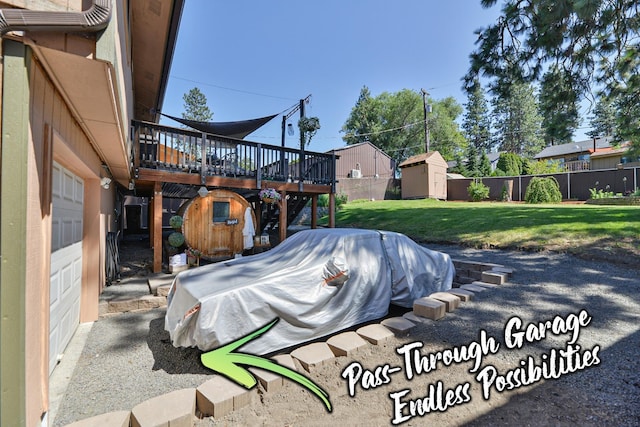 4232 E 10th Ave, Spokane, WA 99202 - view of patio with a storage unit and a wooden deck