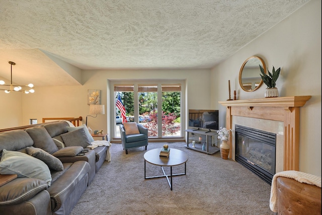 4232 E 10th Ave, Spokane, WA 99202 - living room with carpet, a high end fireplace, a textured ceiling, and a chandelier