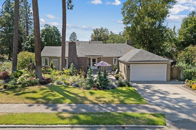 2718 S Hatch St, Spokane, WA 99203 - ranch-style house featuring an attached garage and concrete driveway