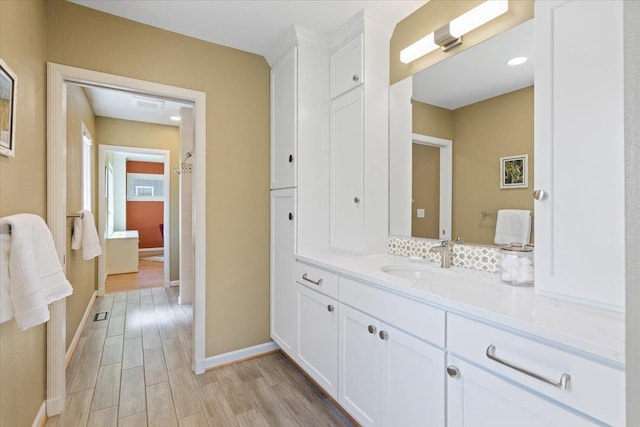 2718 S Hatch St, Spokane, WA 99203 - bathroom with vanity and wood finished floors