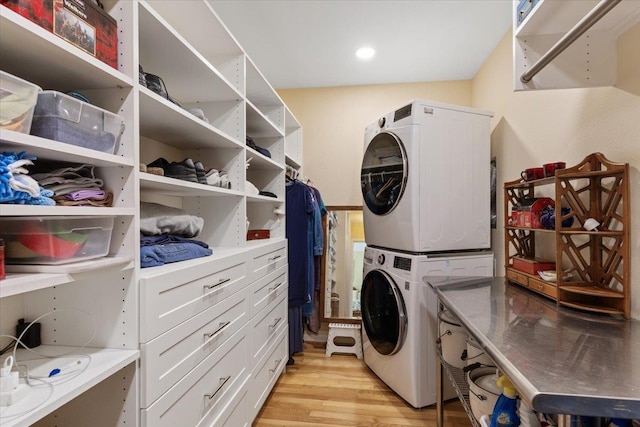 2718 S Hatch St, Spokane, WA 99203 - laundry area with stacked washer / dryer and light wood-style floors