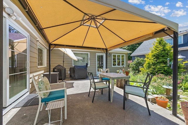 2718 S Hatch St, Spokane, WA 99203 - view of patio / terrace with a gazebo, outdoor dining space, and a grill