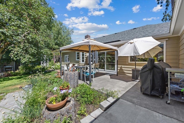 2718 S Hatch St, Spokane, WA 99203 - rear view of property featuring a patio and a shingled roof