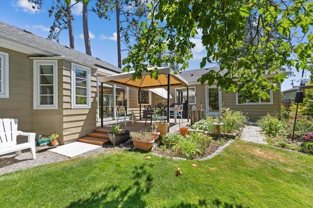 2718 S Hatch St, Spokane, WA 99203 - back of property featuring a lawn, a gazebo, and a shingled roof