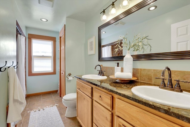 2116 N Jefferson St, Spokane, WA 99205 - full bathroom with double vanity and tile patterned floors