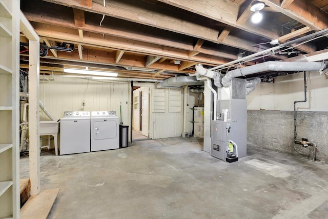 2116 N Jefferson St, Spokane, WA 99205 - unfinished below grade area featuring washing machine and dryer and heating unit