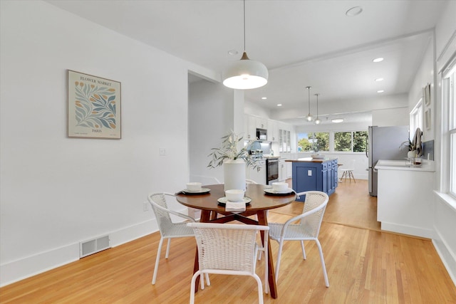2116 N Jefferson St, Spokane, WA 99205 - dining area with light wood-style floors and recessed lighting