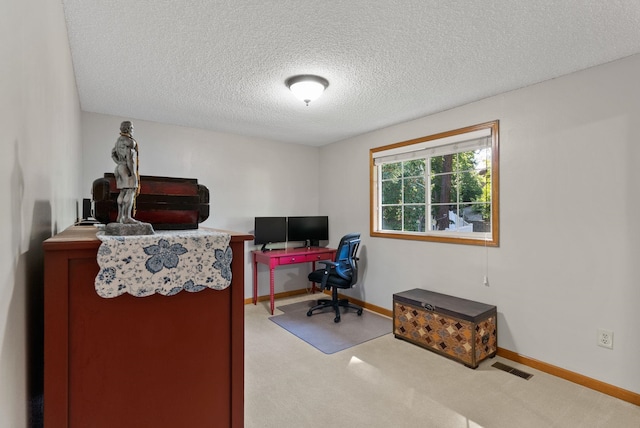 11919 S Player Dr, Spokane, WA 99223 - carpeted home office featuring a textured ceiling and baseboards