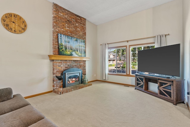 11919 S Player Dr, Spokane, WA 99223 - carpeted living room with a brick fireplace and a towering ceiling