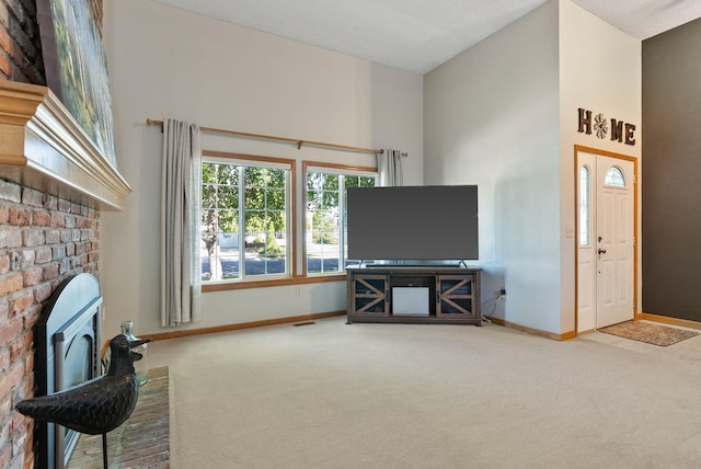 11919 S Player Dr, Spokane, WA 99223 - living room with carpet floors and a towering ceiling