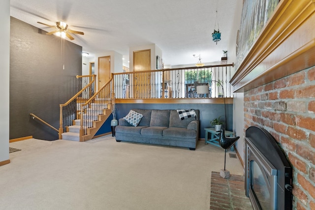11919 S Player Dr, Spokane, WA 99223 - living area featuring carpet, a ceiling fan, and stairway