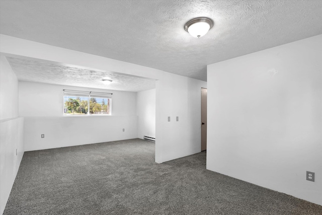 10109 E 9th Ave, Spokane Valley, WA 99206 - carpeted empty room featuring a textured ceiling and baseboard heating