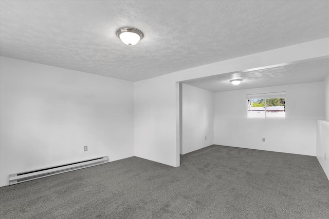 10109 E 9th Ave, Spokane Valley, WA 99206 - carpeted spare room with baseboard heating and a textured ceiling