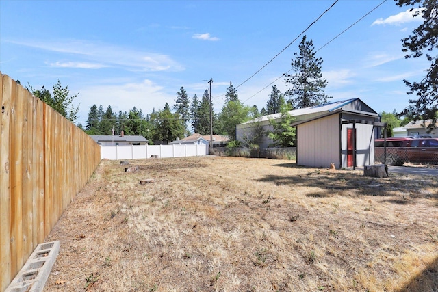 10109 E 9th Ave, Spokane Valley, WA 99206 - fenced backyard featuring a storage shed