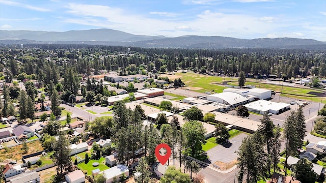10109 E 9th Ave, Spokane Valley, WA 99206 - aerial view of residential area with a mountainous background and a forest