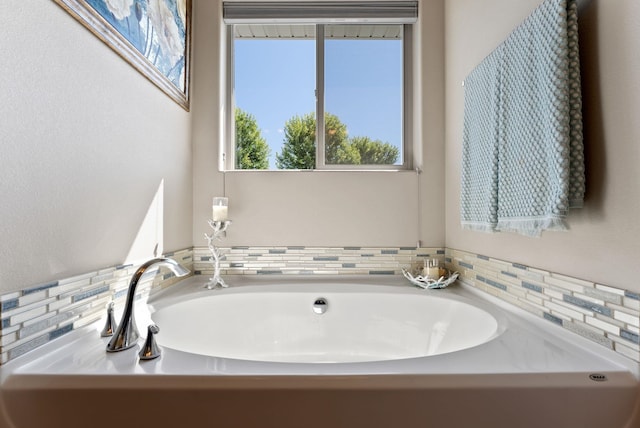 1115 S Mcmillan Rd, Spokane Valley, WA 99016 - bathroom with decorative backsplash and a garden tub