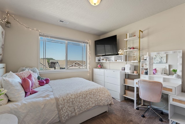 1115 S Mcmillan Rd, Spokane Valley, WA 99016 - bedroom with carpet flooring and a textured ceiling