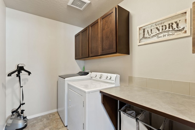 1115 S Mcmillan Rd, Spokane Valley, WA 99016 - laundry room with cabinet space and washer and dryer
