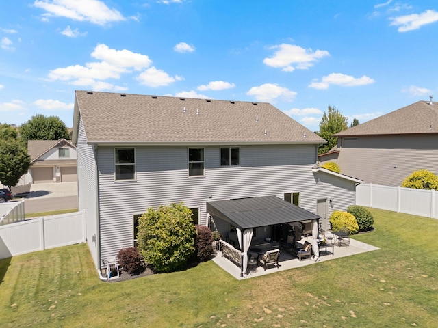 1115 S Mcmillan Rd, Spokane Valley, WA 99016 - back of house featuring a patio area, a fenced backyard, a shingled roof, and a gazebo