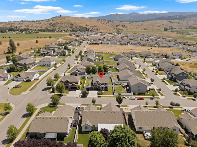 1115 S Mcmillan Rd, Spokane Valley, WA 99016 - aerial overview of property's location with nearby suburban area and mountains