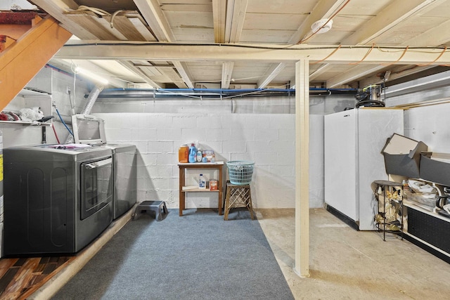 7225 E 11th Ave, Spokane, WA 99212 - unfinished basement with independent washer and dryer and freestanding refrigerator