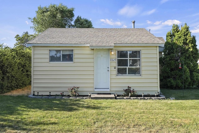 7225 E 11th Ave, Spokane, WA 99212 - bungalow-style home featuring a front yard and roof with shingles
