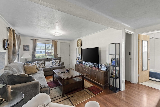 7225 E 11th Ave, Spokane, WA 99212 - living area with wood finished floors and a textured ceiling
