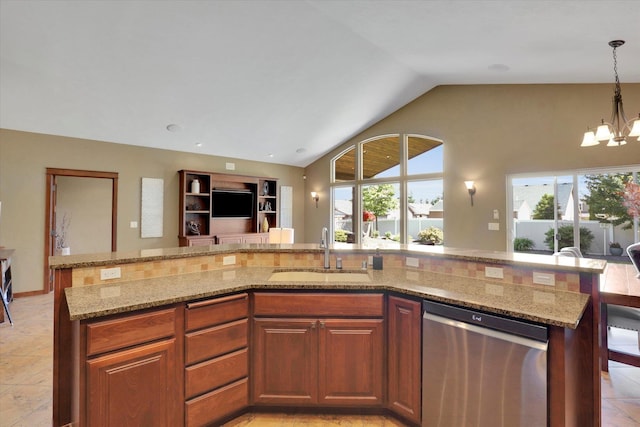 202 E Alexa Ct, Spokane, WA 99208 - kitchen with stainless steel dishwasher, open floor plan, a chandelier, vaulted ceiling, and light stone countertops