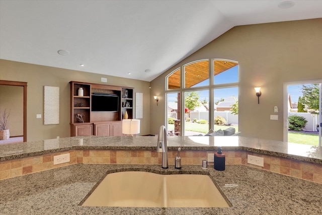 202 E Alexa Ct, Spokane, WA 99208 - kitchen featuring stone countertops, lofted ceiling, and healthy amount of natural light