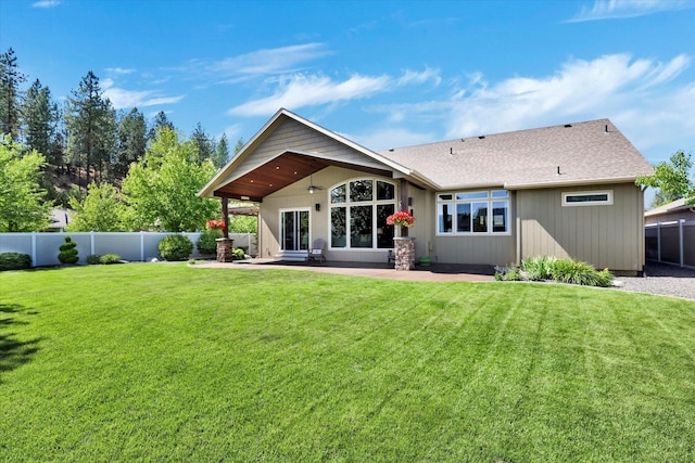 202 E Alexa Ct, Spokane, WA 99208 - back of property with a ceiling fan, a fenced backyard, a patio, and roof with shingles