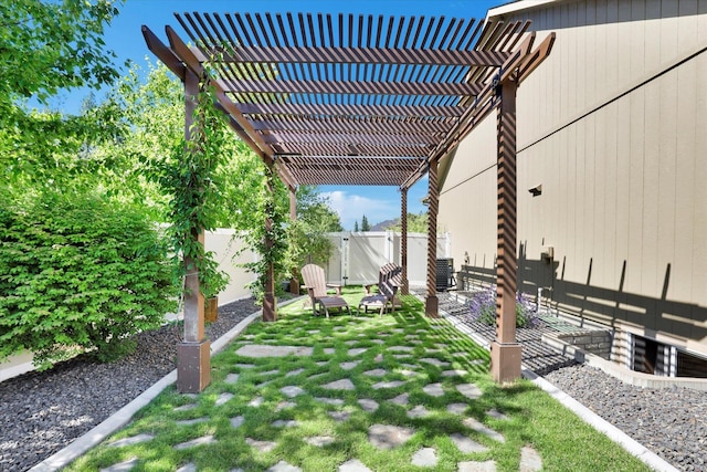 202 E Alexa Ct, Spokane, WA 99208 - fenced backyard featuring a pergola and a gate