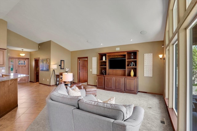 202 E Alexa Ct, Spokane, WA 99208 - living room with light tile patterned floors and high vaulted ceiling