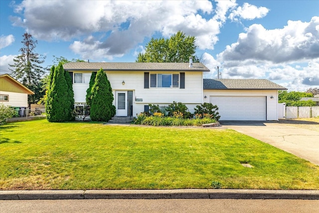 14020 S Sharp Ave, Spokane Valley, WA 99216 - bi-level home with driveway and a garage