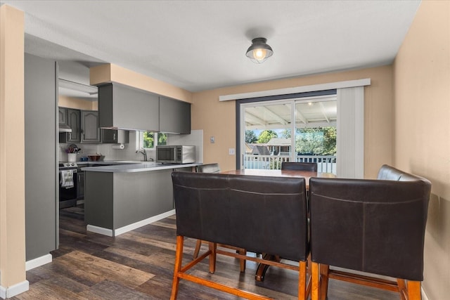14020 S Sharp Ave, Spokane Valley, WA 99216 - dining room featuring dark wood finished floors