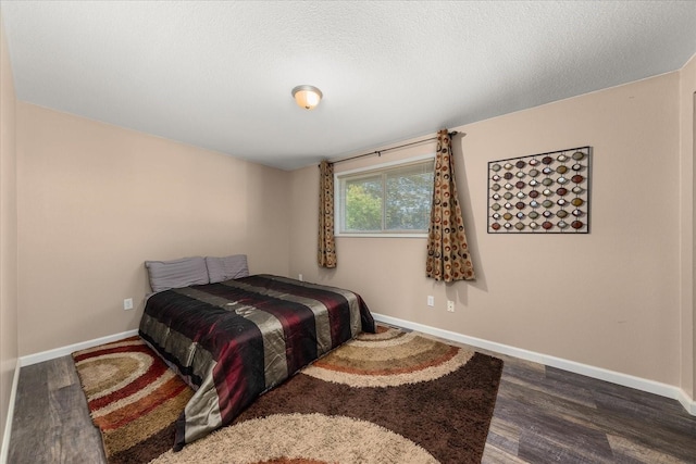 14020 S Sharp Ave, Spokane Valley, WA 99216 - bedroom with wood finished floors and baseboards