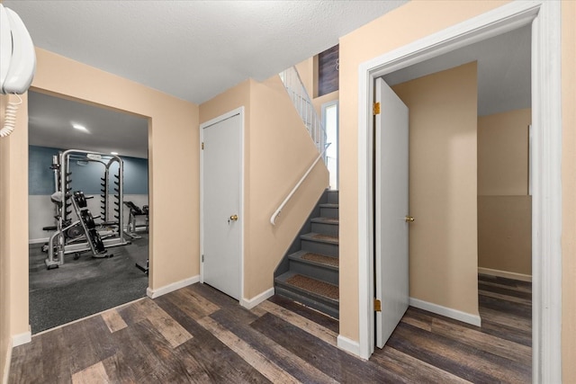 14020 S Sharp Ave, Spokane Valley, WA 99216 - stairs featuring wood finished floors and a wall unit AC