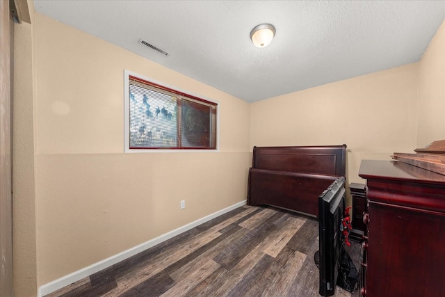 14020 S Sharp Ave, Spokane Valley, WA 99216 - bedroom with wood finished floors and baseboards