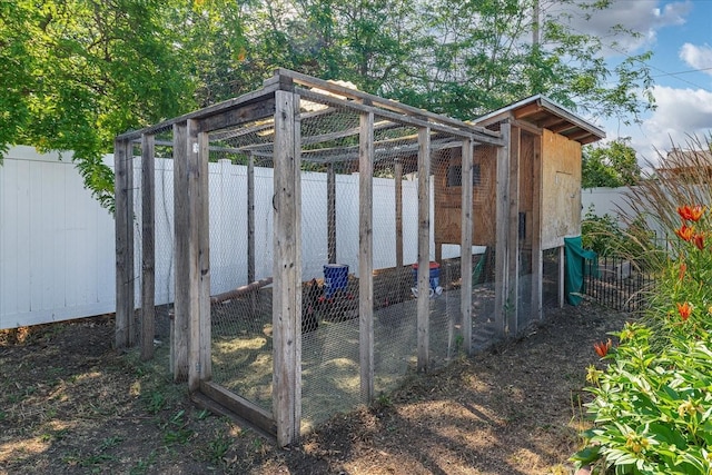 14020 S Sharp Ave, Spokane Valley, WA 99216 - view of poultry coop with a fenced backyard