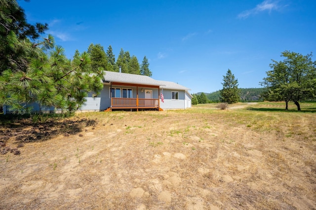 9801 Lakeshore Dr, Sagle, ID 83860 - rear view of house featuring a deck