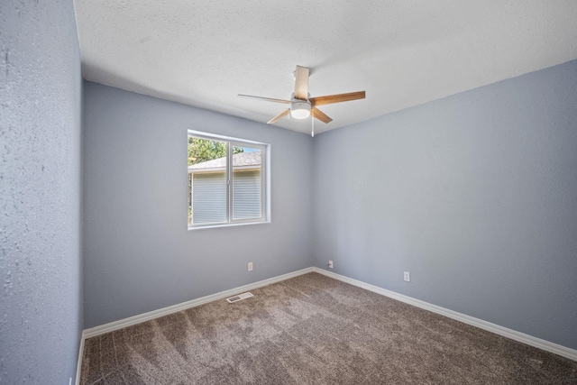9801 Lakeshore Dr, Sagle, ID 83860 - carpeted empty room with ceiling fan and baseboards