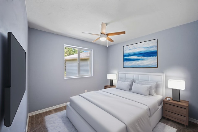 9801 Lakeshore Dr, Sagle, ID 83860 - carpeted bedroom with baseboards and ceiling fan