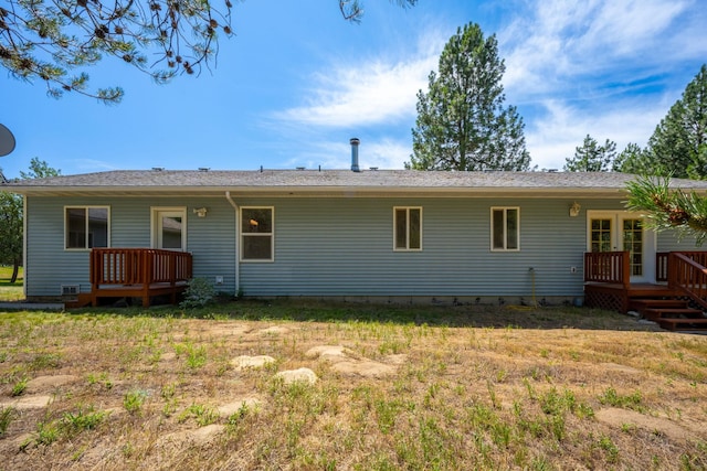 9801 Lakeshore Dr, Sagle, ID 83860 - back of house with a wooden deck