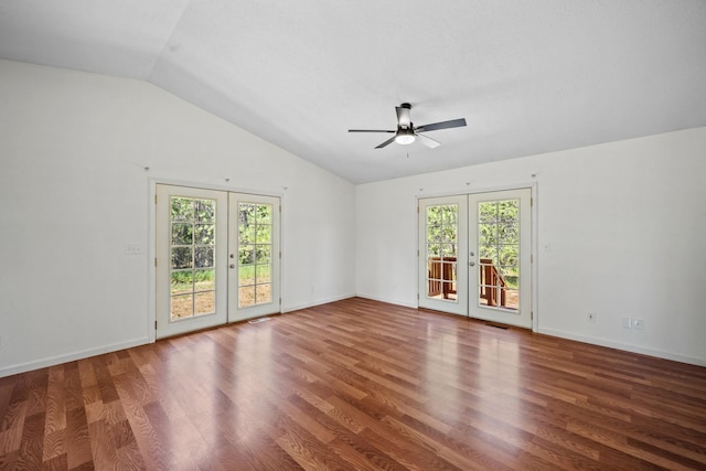9801 Lakeshore Dr, Sagle, ID 83860 - spare room featuring french doors, vaulted ceiling, ceiling fan, and wood finished floors