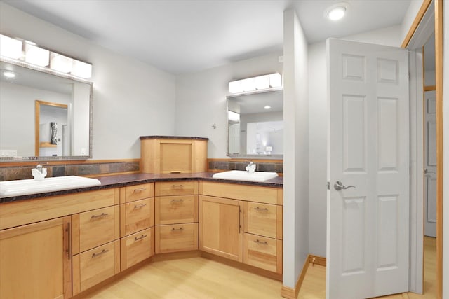 2714 E 11th Ave, Spokane, WA 99202 - bathroom with double vanity and wood finished floors