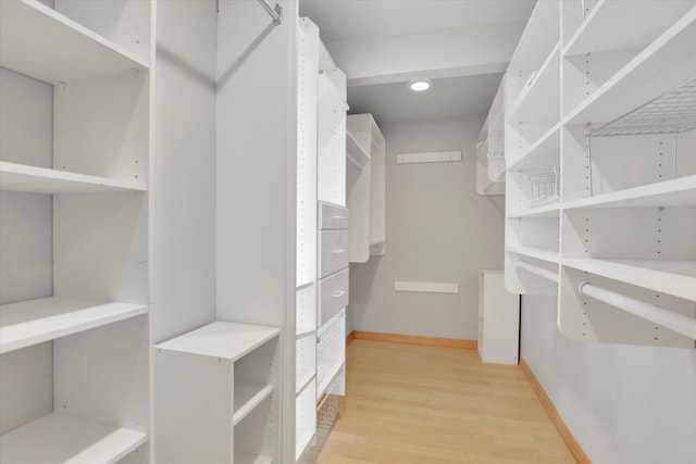 2714 E 11th Ave, Spokane, WA 99202 - walk in closet with light wood-type flooring
