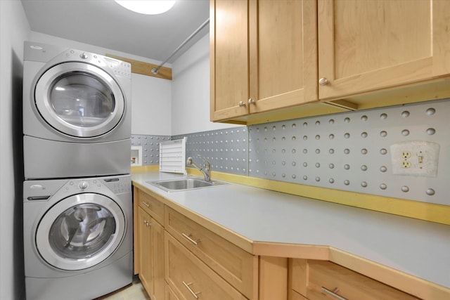 2714 E 11th Ave, Spokane, WA 99202 - washroom featuring estacked washer and dryer and a sink