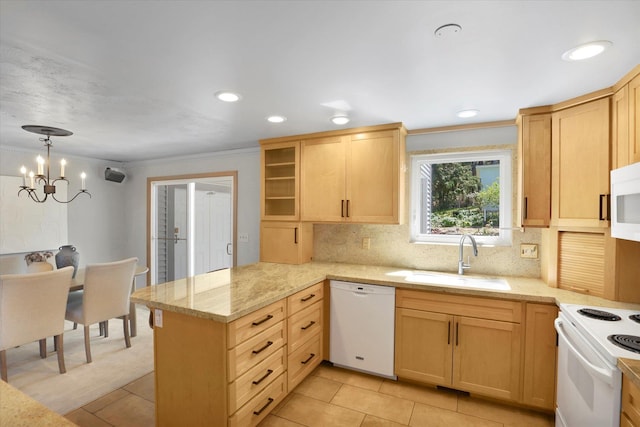 2714 E 11th Ave, Spokane, WA 99202 - kitchen featuring white appliances, a peninsula, ornamental molding, decorative backsplash, and light stone counters