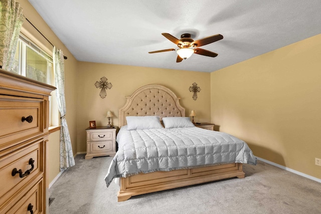 7905 W Seven Mile Rd, Nine Mile Falls, WA 99026 - bedroom with light colored carpet and a ceiling fan
